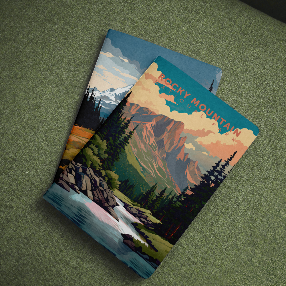 Rocky Mountain National Park pocket notebook with a mountain peak and stream cover on green fabric.