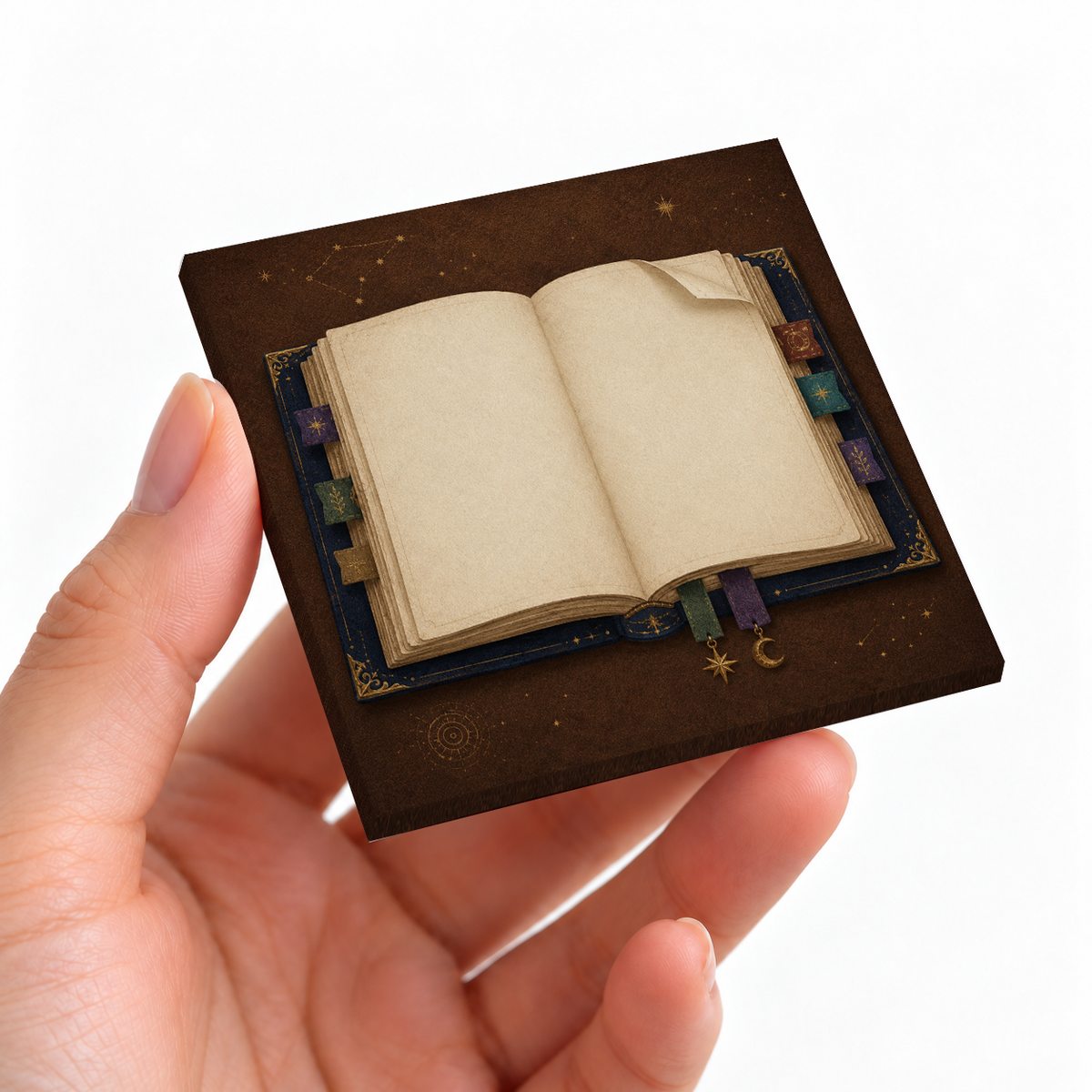 Celestial Spellbook sticky note pad on a desk with stationery
