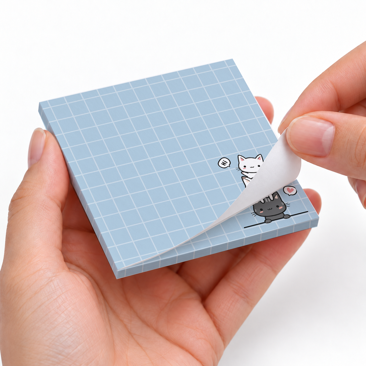 Stacked Cats Grid sticky notes styled with a planner and desk accessories