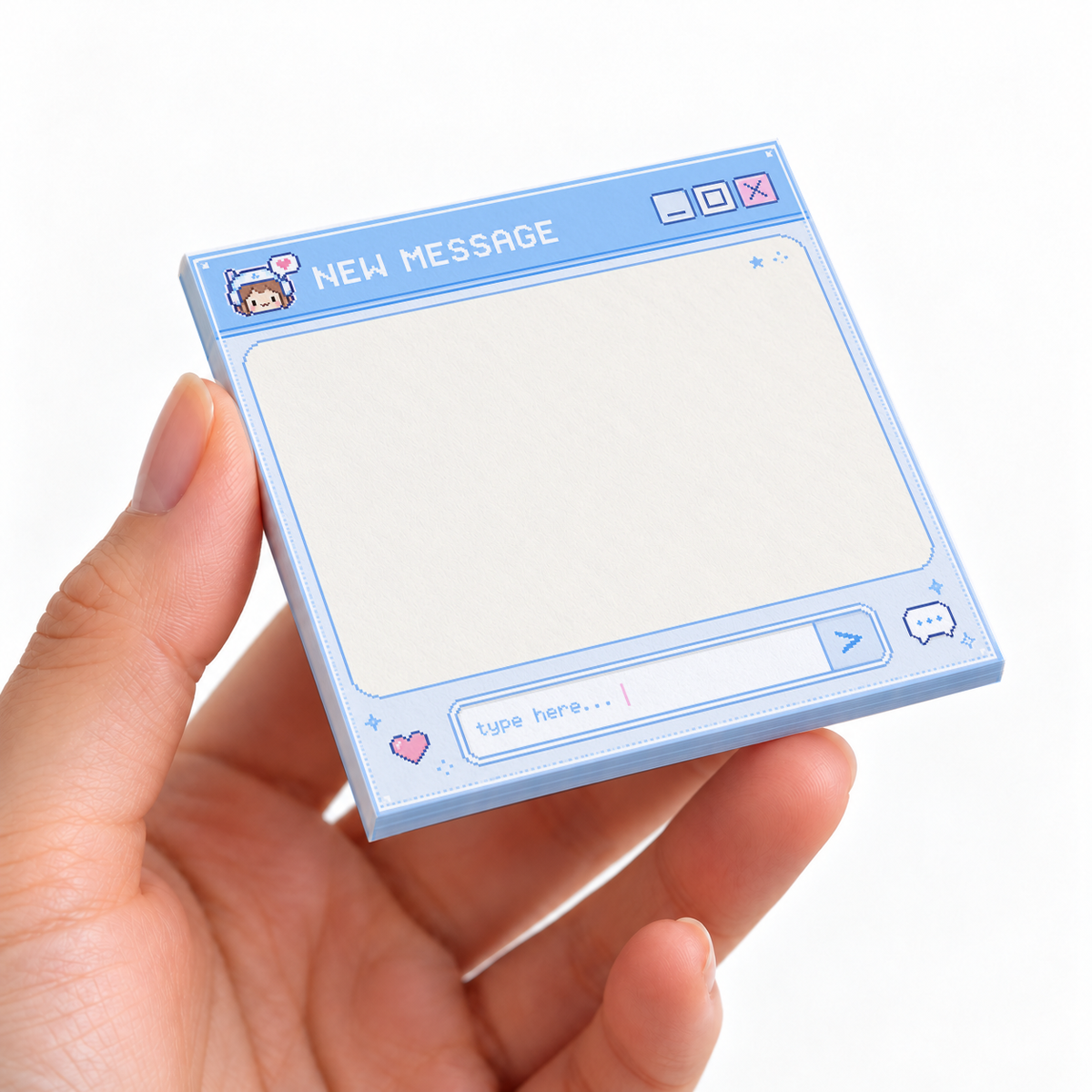 Pastel Blue Pixel Art New Message sticky note pad on a desk with stationery