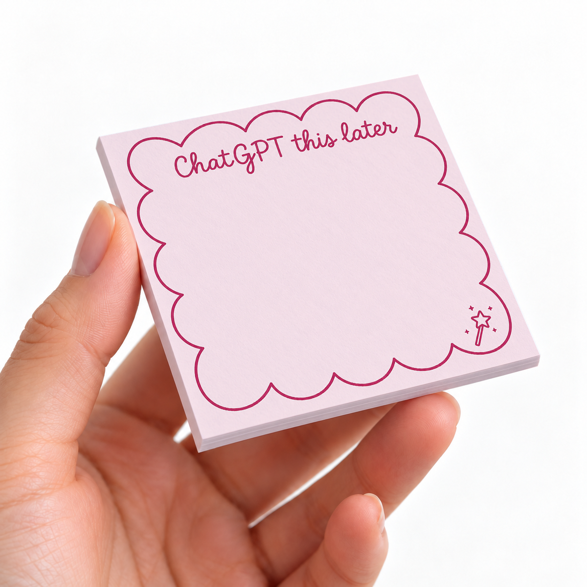 Pink Magic Wand "ChatGPT This Later" sticky note pad on a desk with stationery