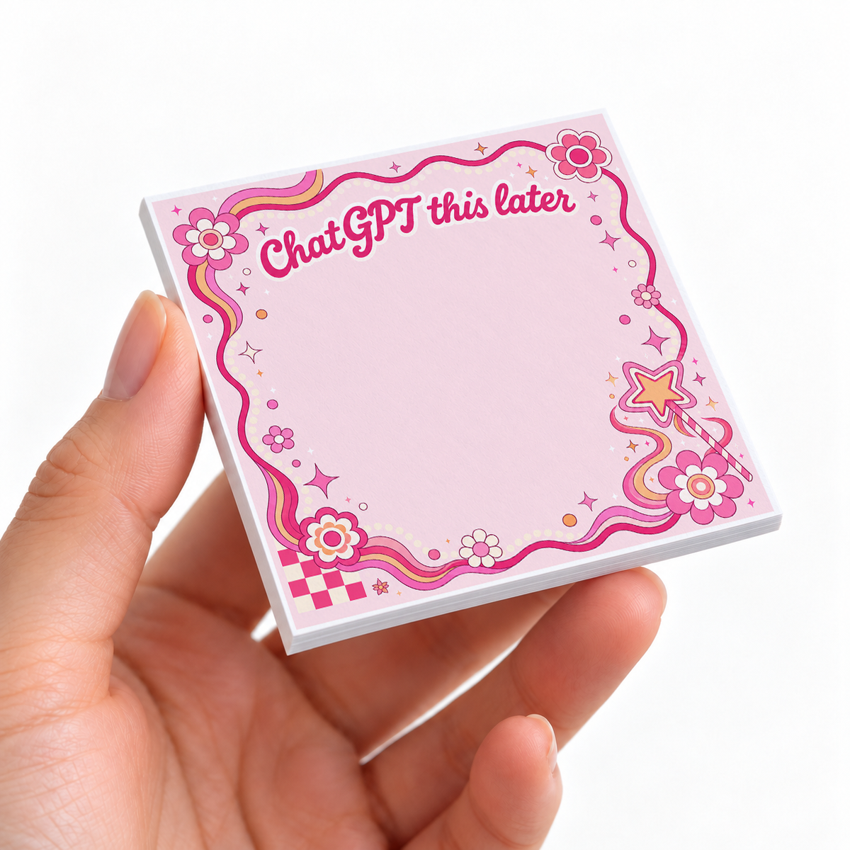 Magic Pink ChatGPT This Later sticky note pad on a desk with stationery
