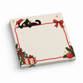 Santa Hat Black Cat sticky note pad with a blank cream center, red border, bow, gifts, and evergreen decorations.