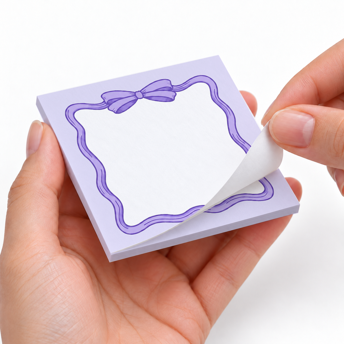 Lavender Coquette Bow sticky notes styled with a planner and desk accessories