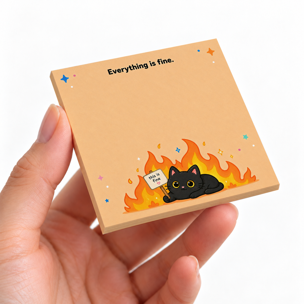 Everything is Fine Cat sticky note pad on a desk with stationery