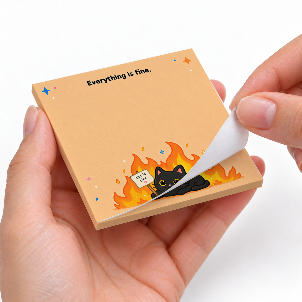 Everything is Fine Cat sticky notes styled with a planner and desk accessories