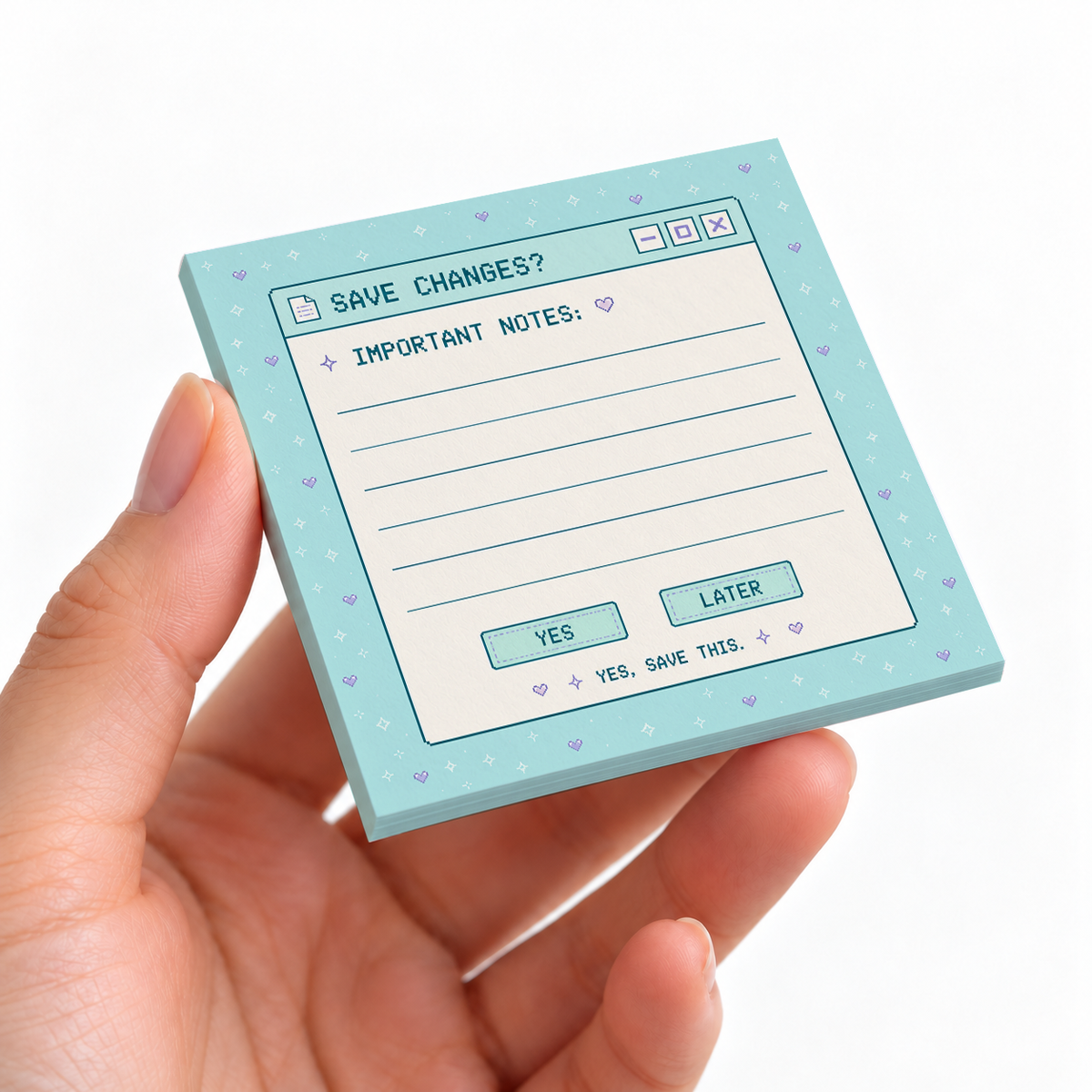 Save Changes Pixel Art sticky note pad on a desk with stationery