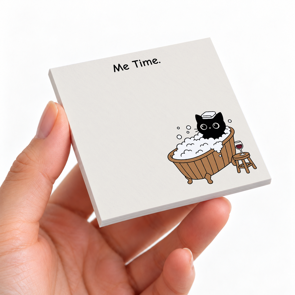 Spa Cat Bubble Bath sticky note pad on a desk with stationery