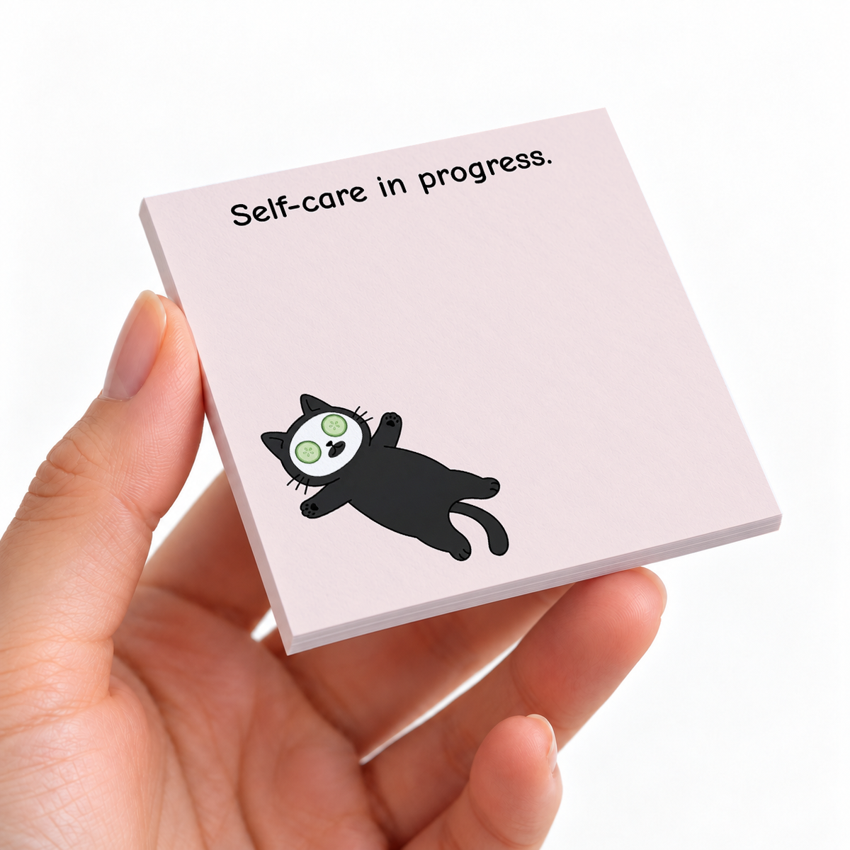 Skincare Cat Face Mask sticky note pad on a desk with stationery