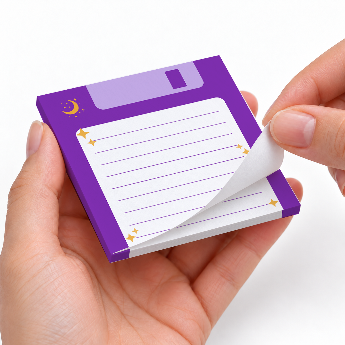 Purple Celestial Floppy Disk sticky notes styled with a planner and desk accessories