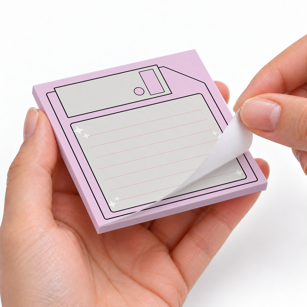 Pastel Pink Floppy Disk sticky notes styled with a planner and desk accessories