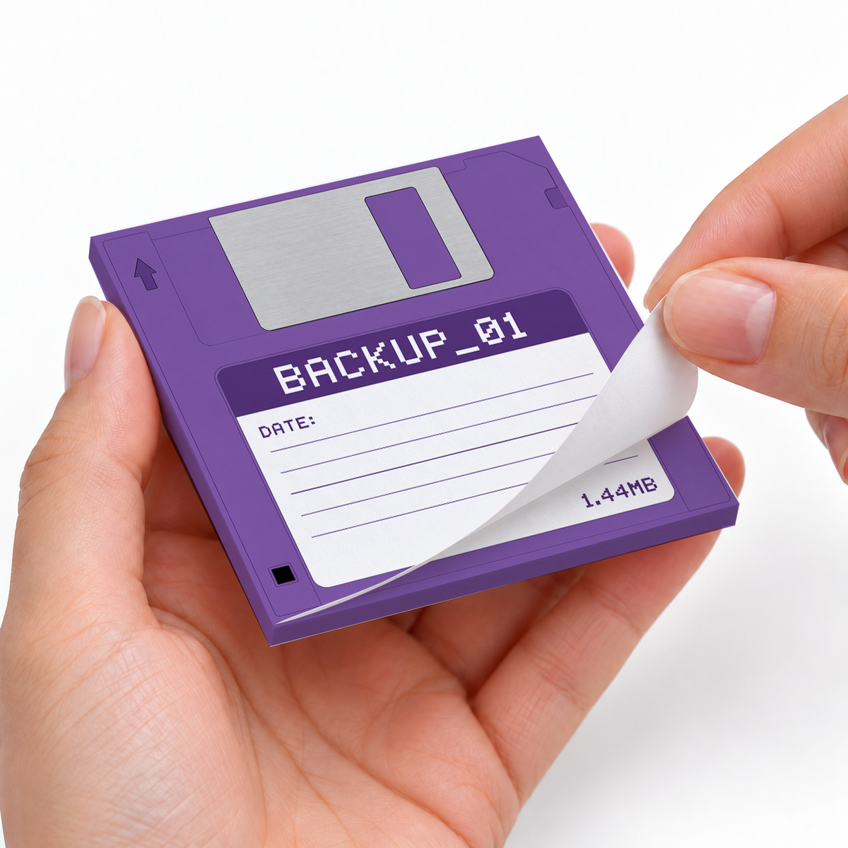 Purple Floppy Disk sticky notes styled with a planner and desk accessories