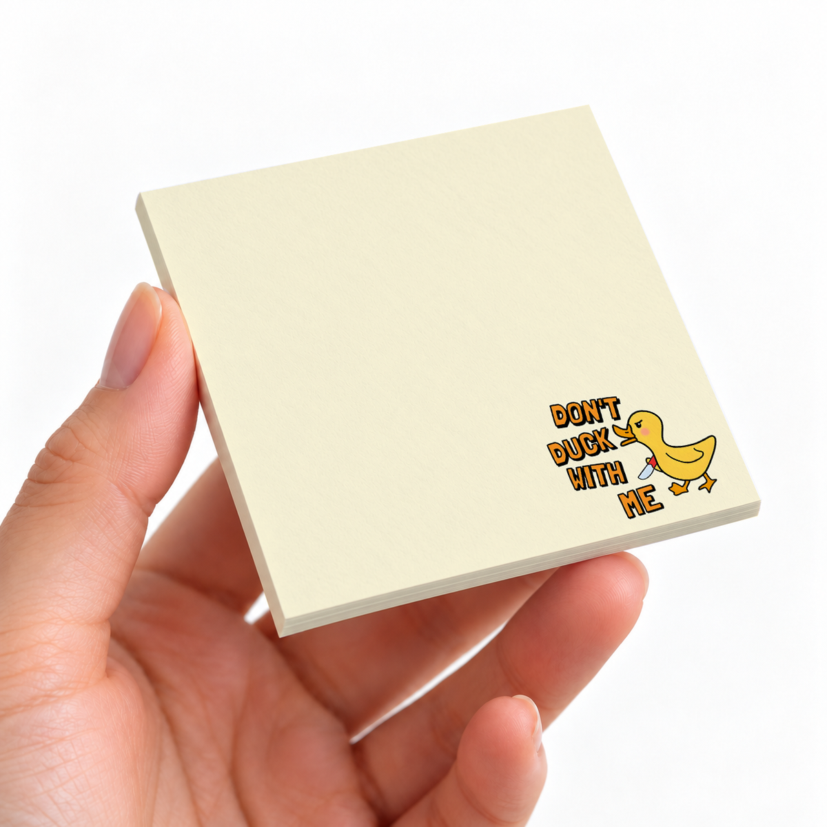 Angry Duck sticky note pad on a desk with stationery