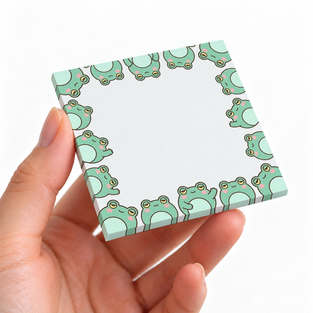Little Frogs Border sticky note pad on a desk with stationery