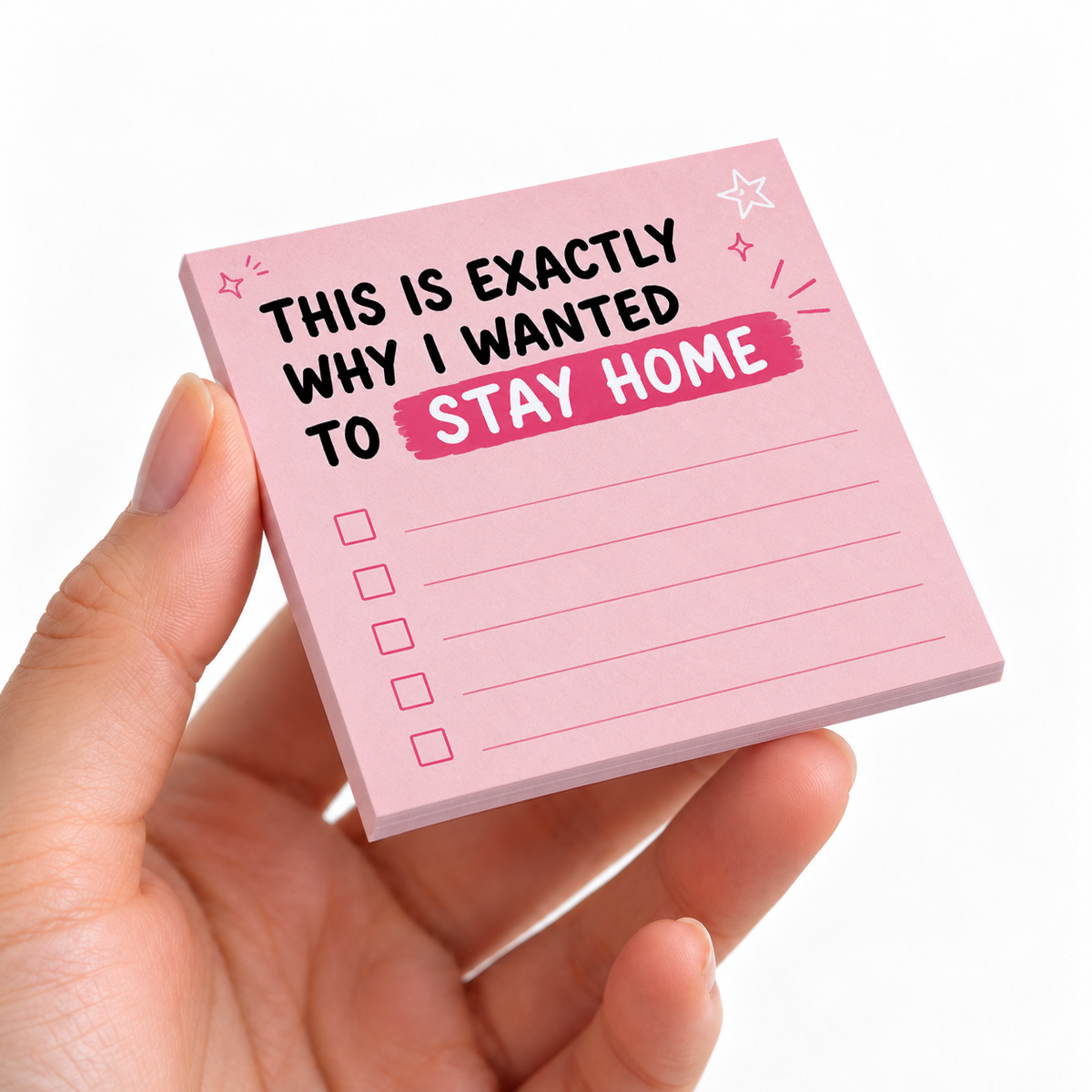 Stay Home Pink Checklist sticky note pad on a desk with stationery