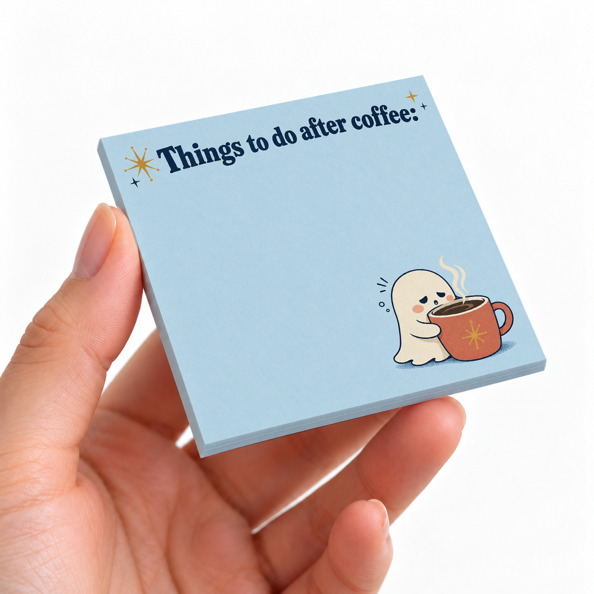 After Coffee Ghost sticky note pad on a desk with stationery