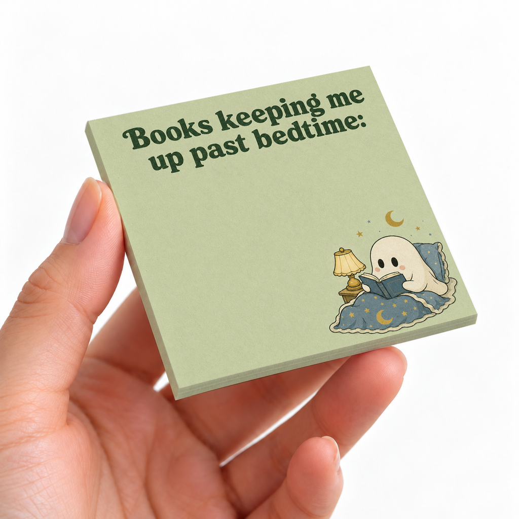 Books Keeping Me Up Ghost sticky note pad on a desk with stationery