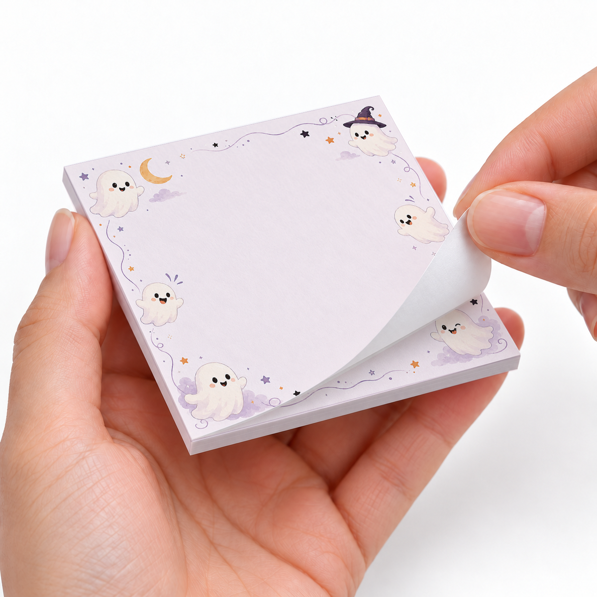 Pastel Floating Ghosts sticky notes styled with a planner and desk accessories