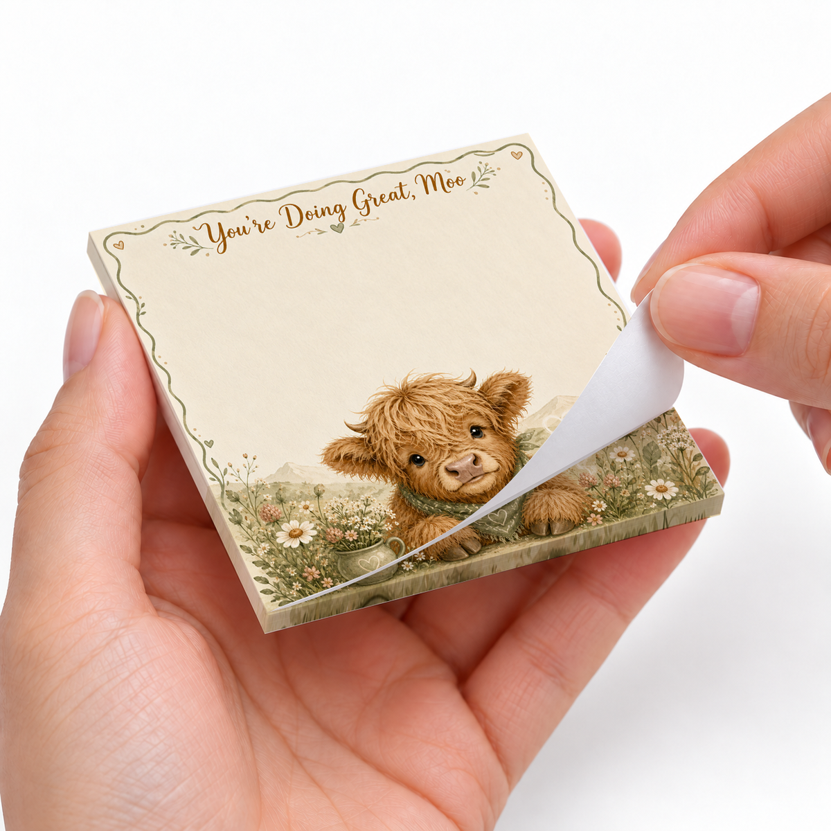 You're Doing Great Moo Highland Cow sticky notes styled with a planner and desk accessories