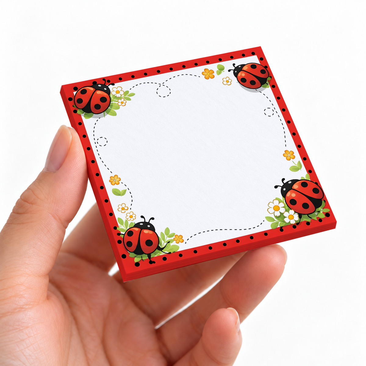 Flying Ladybug Trail sticky note pad on a desk with stationery