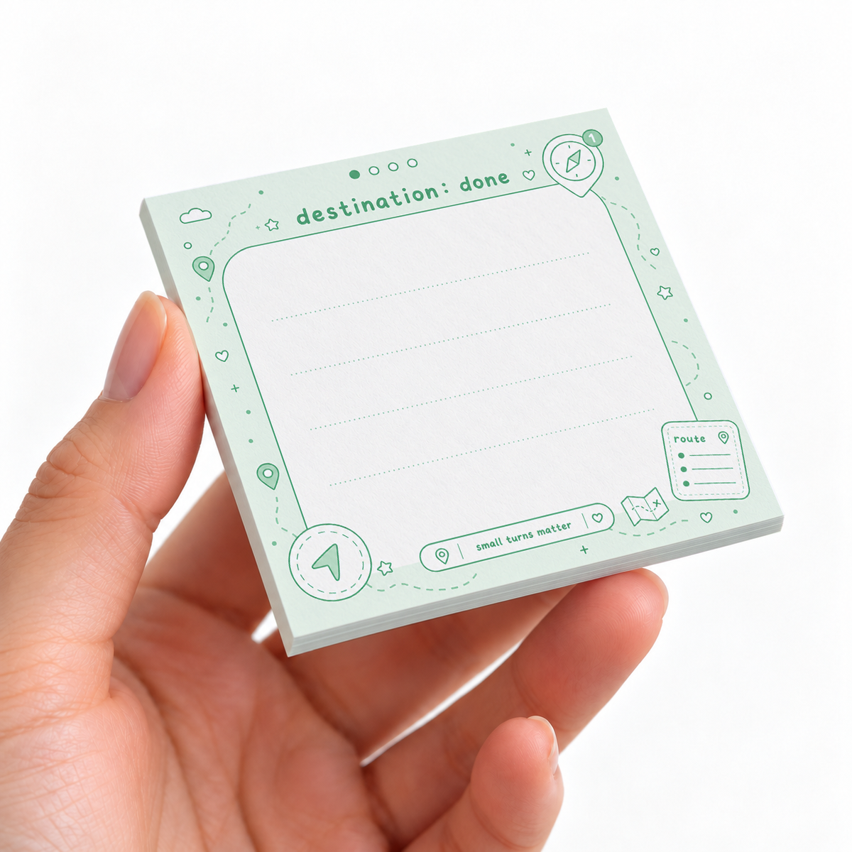 Destination Done Green Map sticky note pad on a desk with stationery
