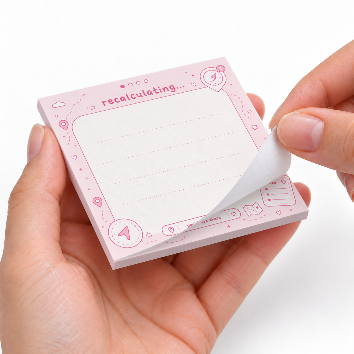 Recalculating Pink Navigation sticky notes styled with a planner and desk accessories