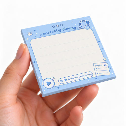Blue Music Player Sticky Notes - Currently Playing sticky note pad on a desk with stationery