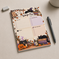 Spooky Witch Cat Today's Plan Notepad featuring Halloween designs, placed on a desk with a black pen and an eraser.