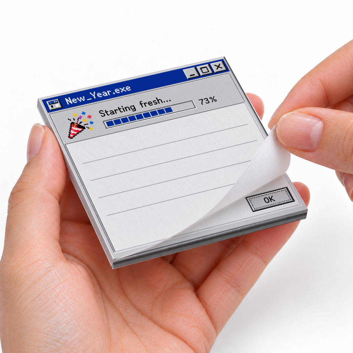 Hands peel back a sheet from a retro New Year loading screen sticky note pad marked “Starting fresh... 73%.”