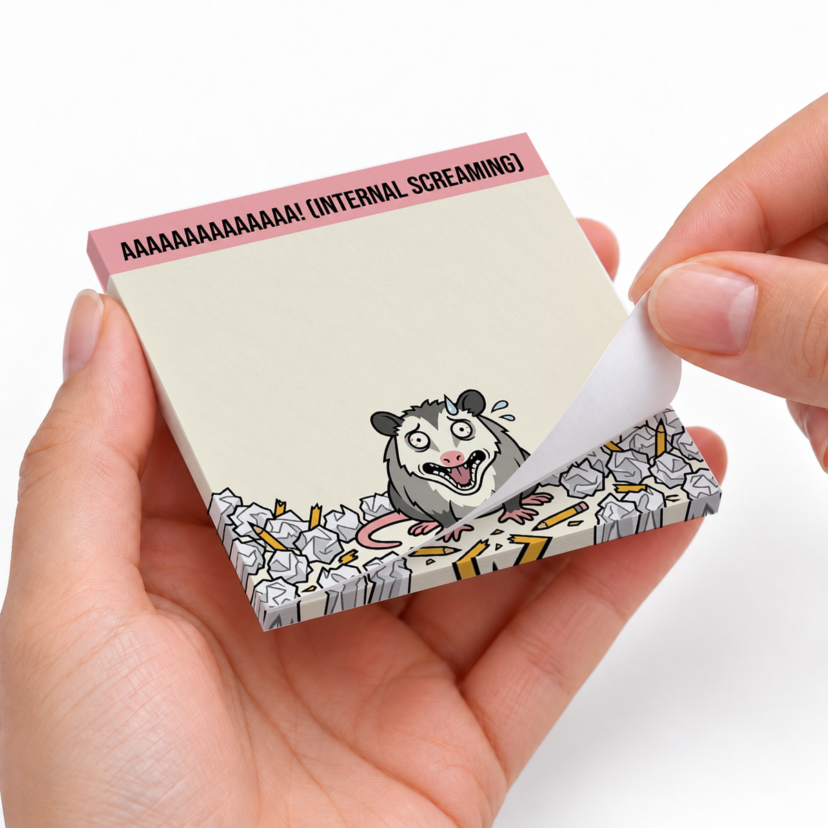 Internal Screaming Opossum sticky notes styled with a planner and desk accessories