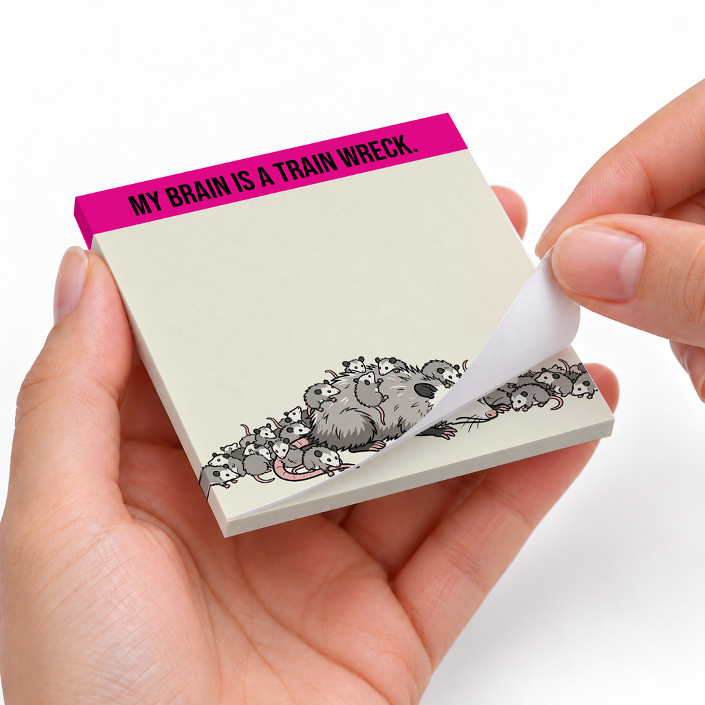 Train Wreck Brain Opossum sticky notes styled with a planner and desk accessories