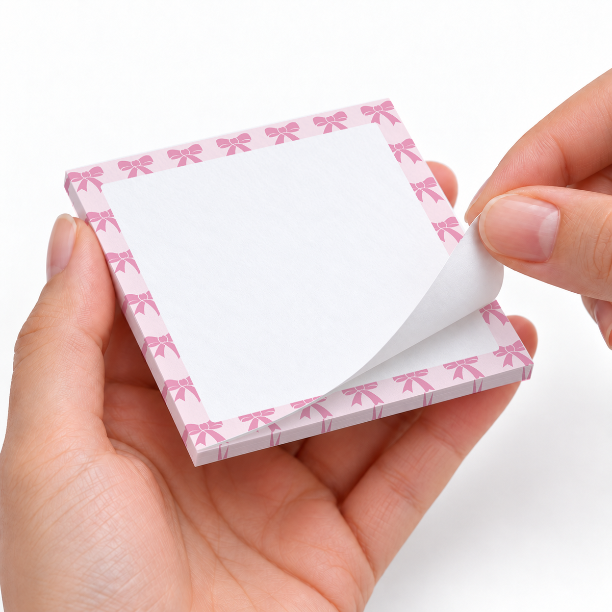 Pink Bow Repeating Border sticky notes styled with a planner and desk accessories