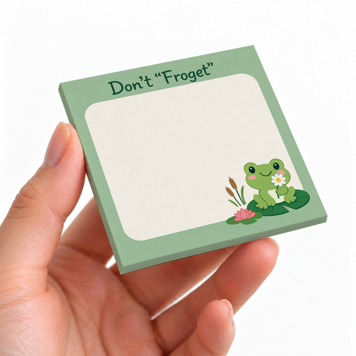 Don't Froget Frog Pun sticky note pad on a desk with stationery