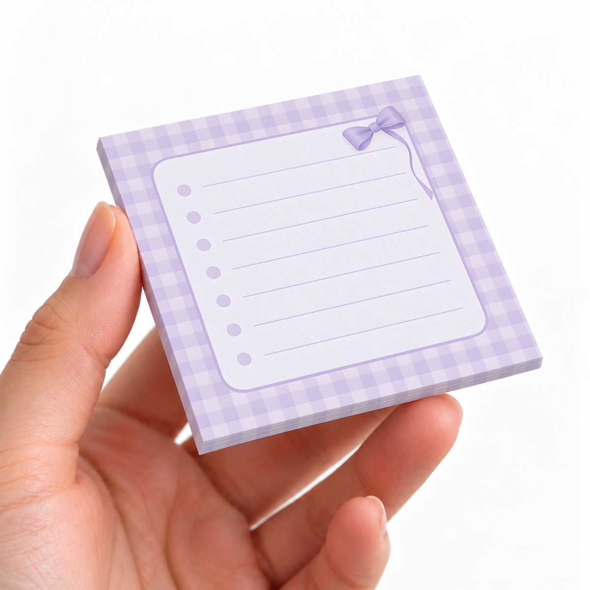 Corner Ribbon Checkered sticky note pad on a desk with stationery