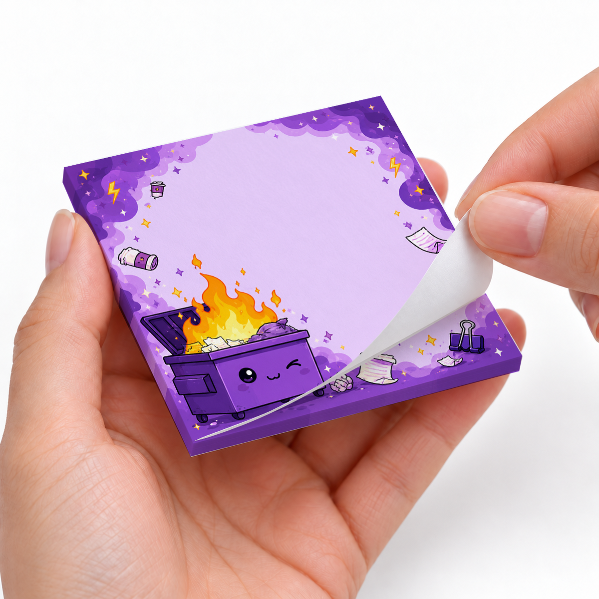 Winking Purple Dumpster Fire sticky notes styled with a planner and desk accessories
