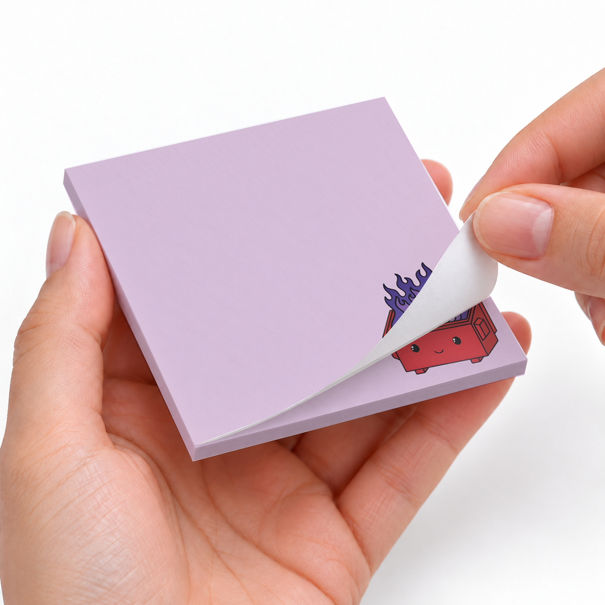 Red Dumpster Fire sticky notes styled with a planner and desk accessories
