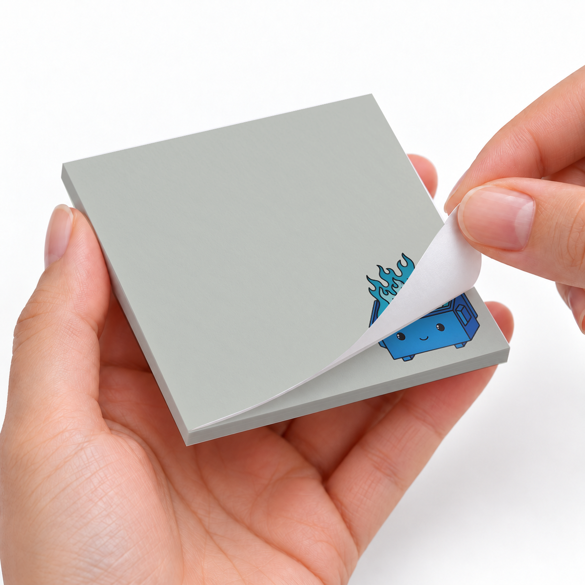 Blue Dumpster Fire sticky notes styled with a planner and desk accessories