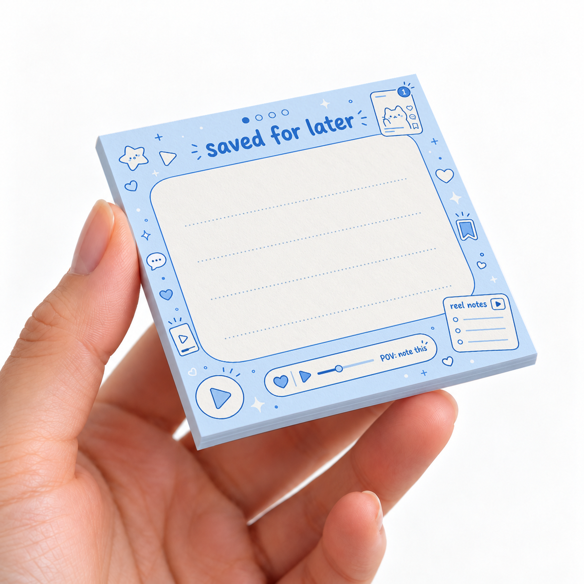 Pastel Blue Saved For Later sticky note pad on a desk with stationery