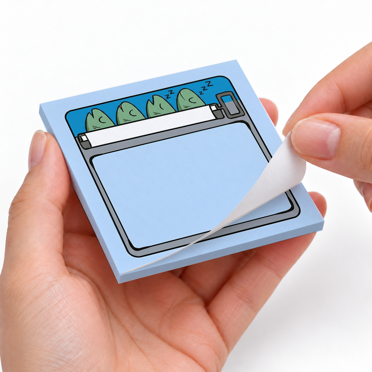Blue Sleeping Fish Sardine sticky notes styled with a planner and desk accessories