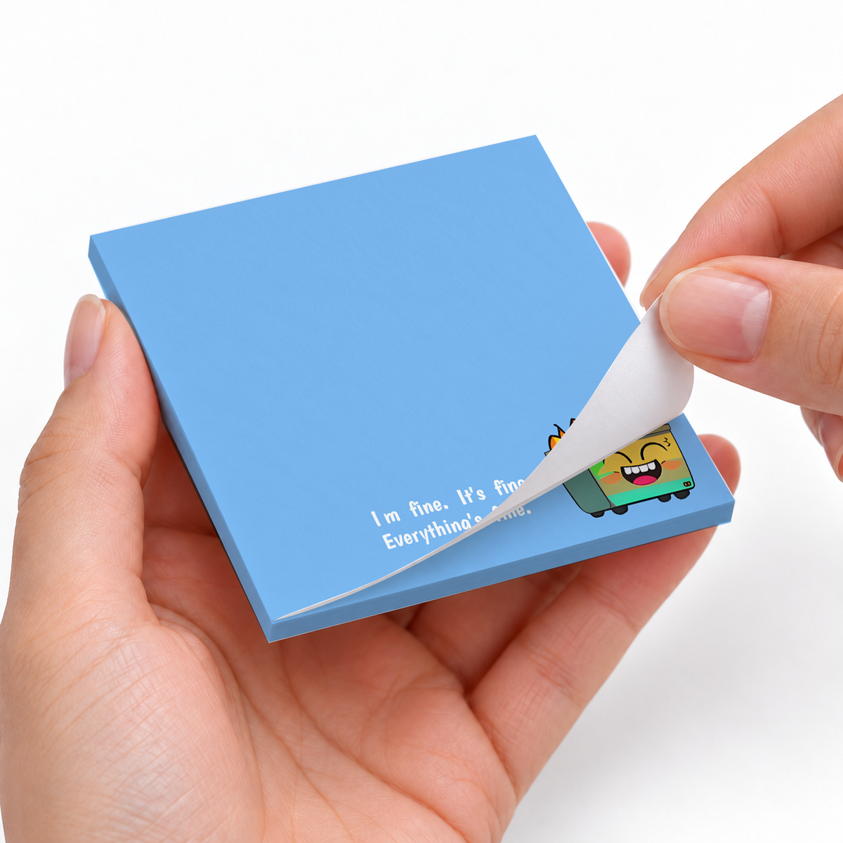 Everything's Fine Dumpster Fire sticky notes styled with a planner and desk accessories