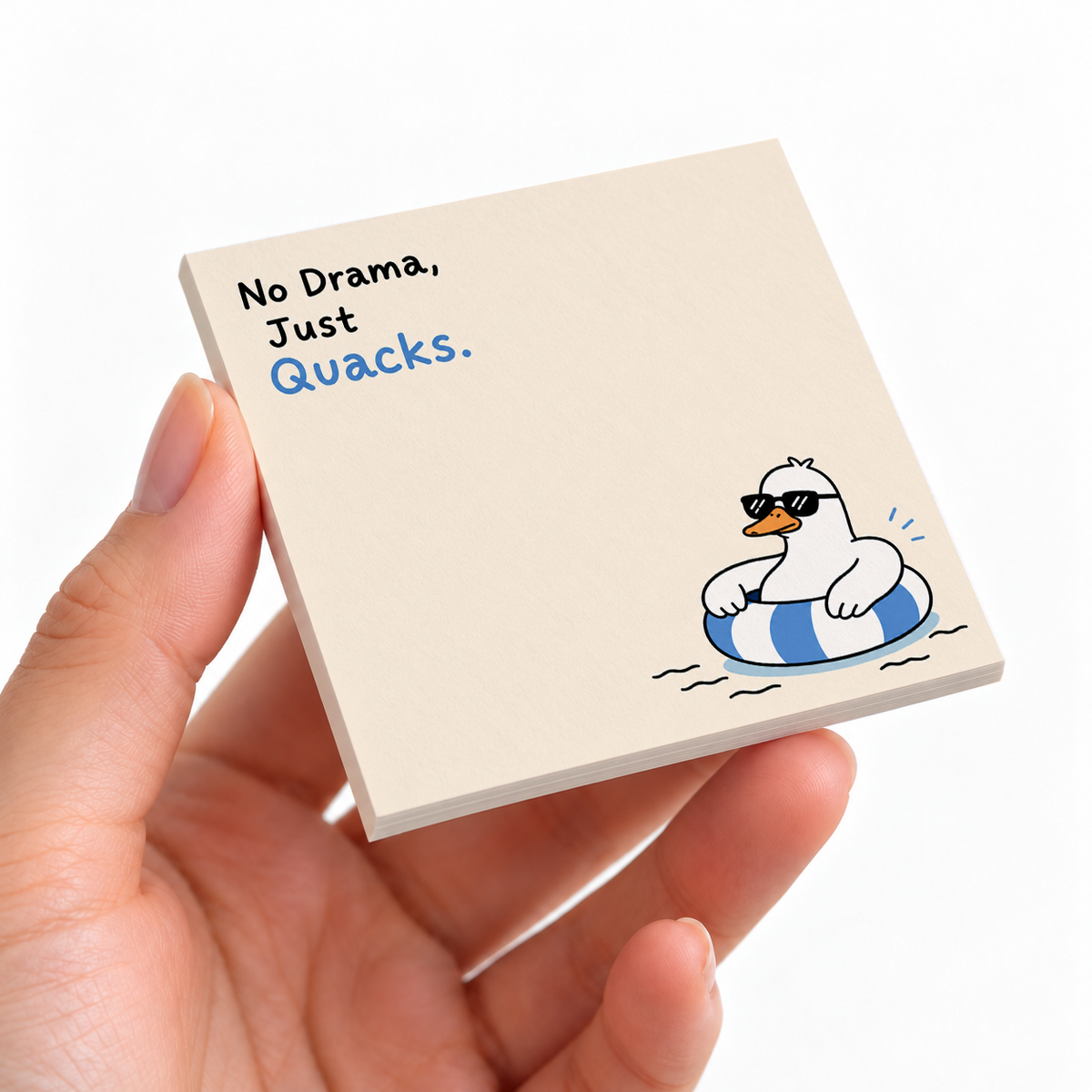 Cool Duck in Pool Tube sticky note pad on a desk with stationery