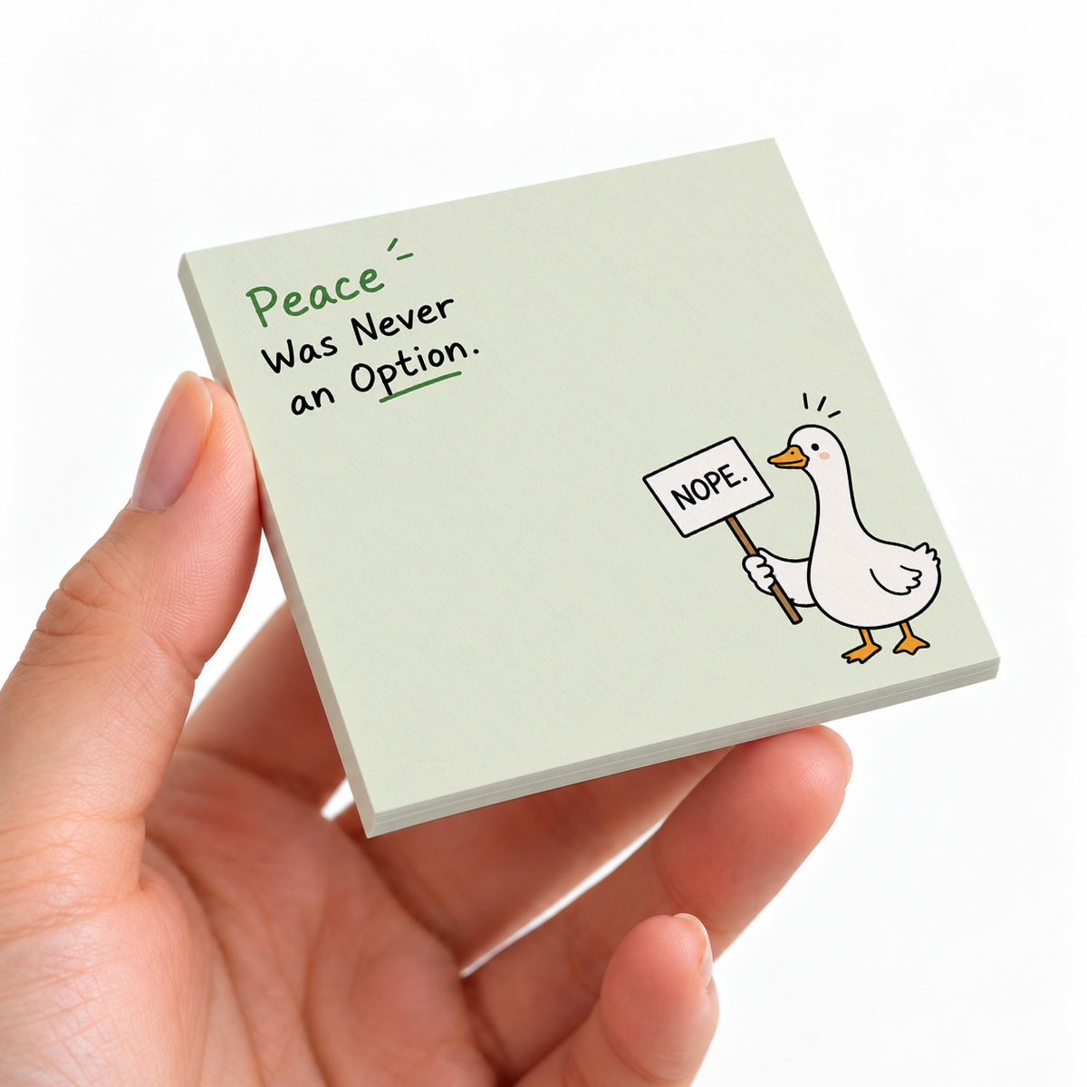 Duck Holding NOPE Sign Sticky Notes - Peace Was Never An Option sticky note pad on a desk with stationery