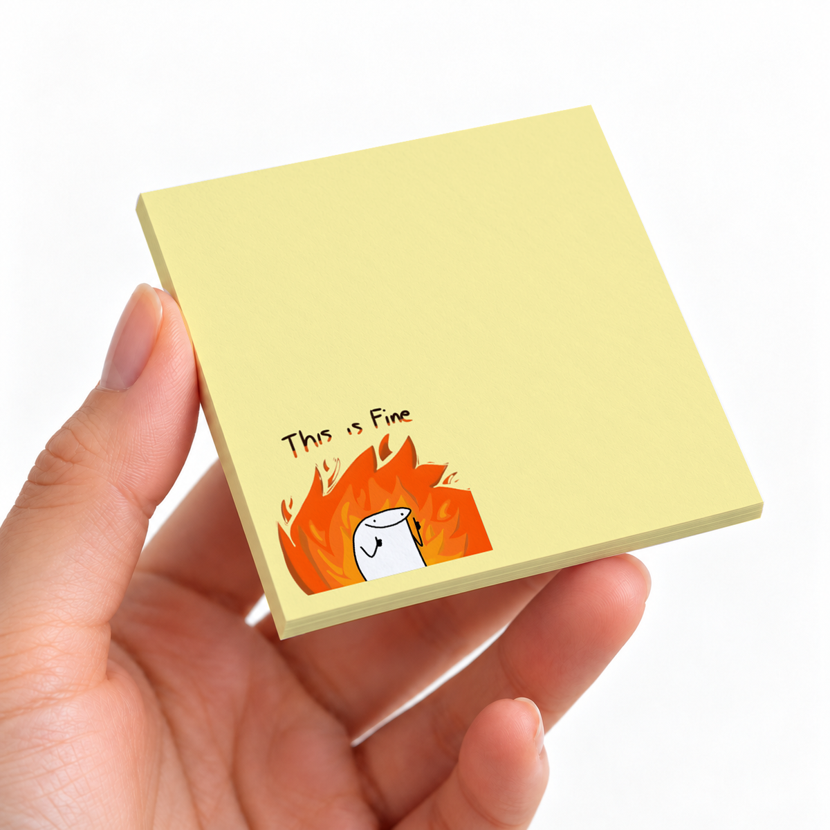 Thumbs Up Fire Meme sticky note pad on a desk with stationery