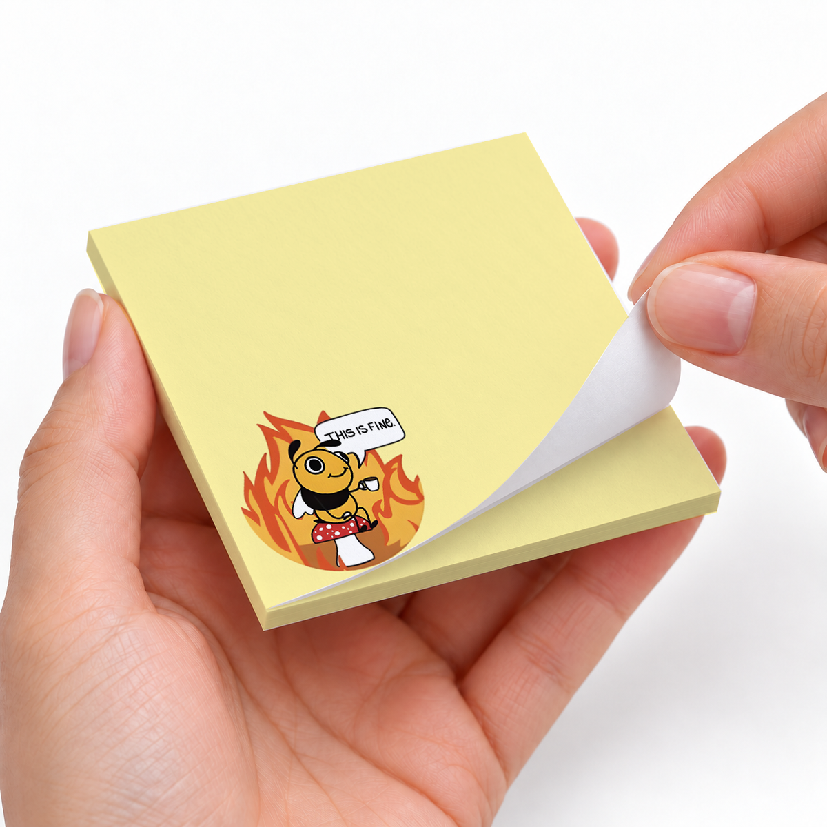 This Is Fine Bee & Mushroom sticky notes styled with a planner and desk accessories