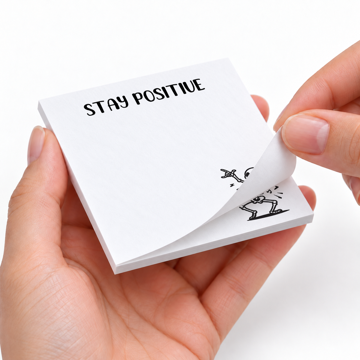 Stay Positive Dancing Skeleton sticky notes styled with a planner and desk accessories