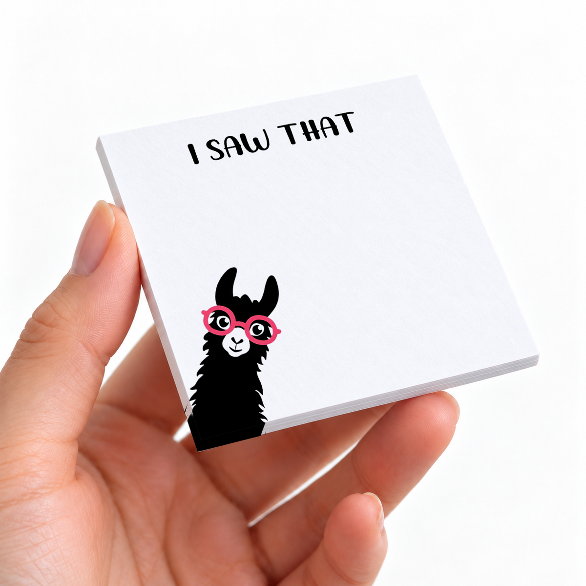 I Saw That Peeking Llama sticky note pad on a desk with stationery